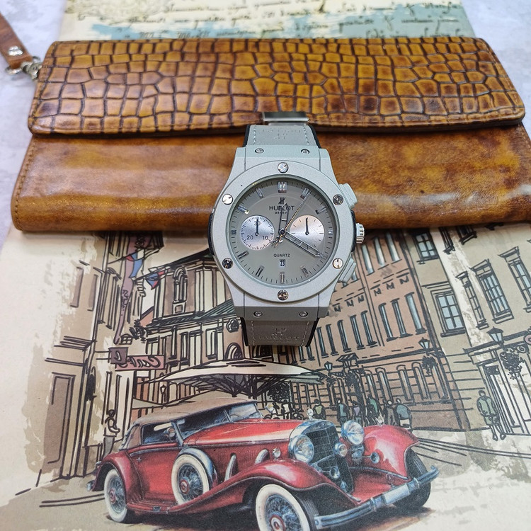 ساعت مچی عقربه ای آنالوگ برند HUBLOT تک موتور تاریخ شمار دار بند چرم قفل فیکسر پروانه ای