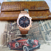 ساعت مچی عقربه ای آنالوگ برند HUBLOT تک موتور تاریخ شمار دار بند چرم قفل فیکسر پروانه ای