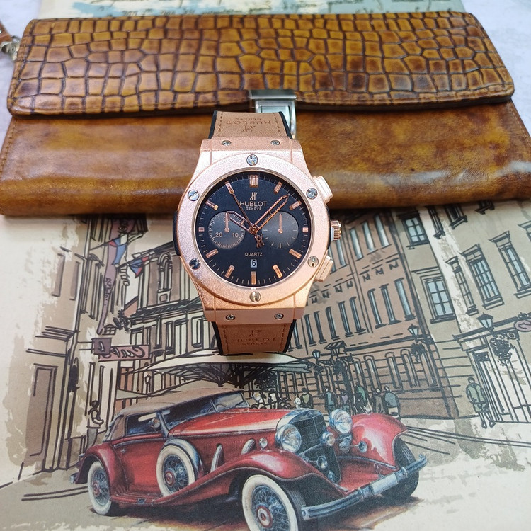 ساعت مچی عقربه ای آنالوگ برند HUBLOT تک موتور تاریخ شمار دار بند چرم قفل فیکسر پروانه ای