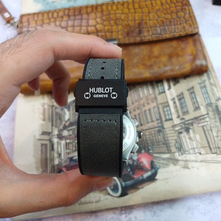 ساعت مچی عقربه ای آنالوگ برند HUBLOT تک موتور تاریخ شمار دار بند چرم قفل فیکسر پروانه ای